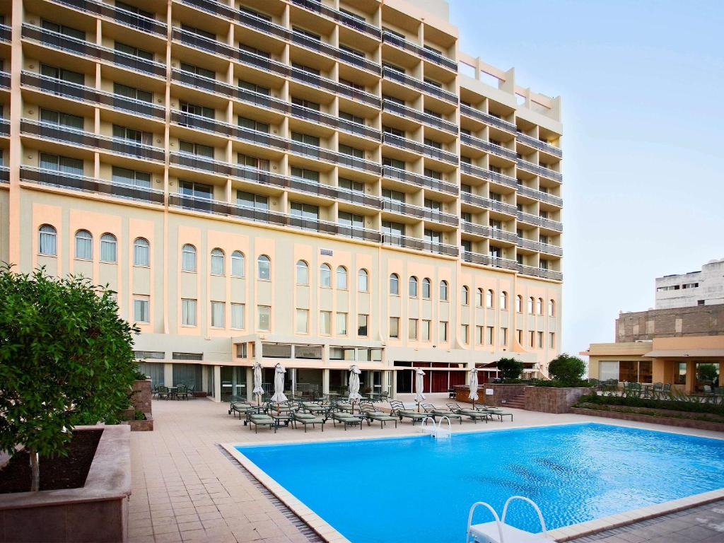 فنادق قريبة من استاد راس أبو عبود قطر