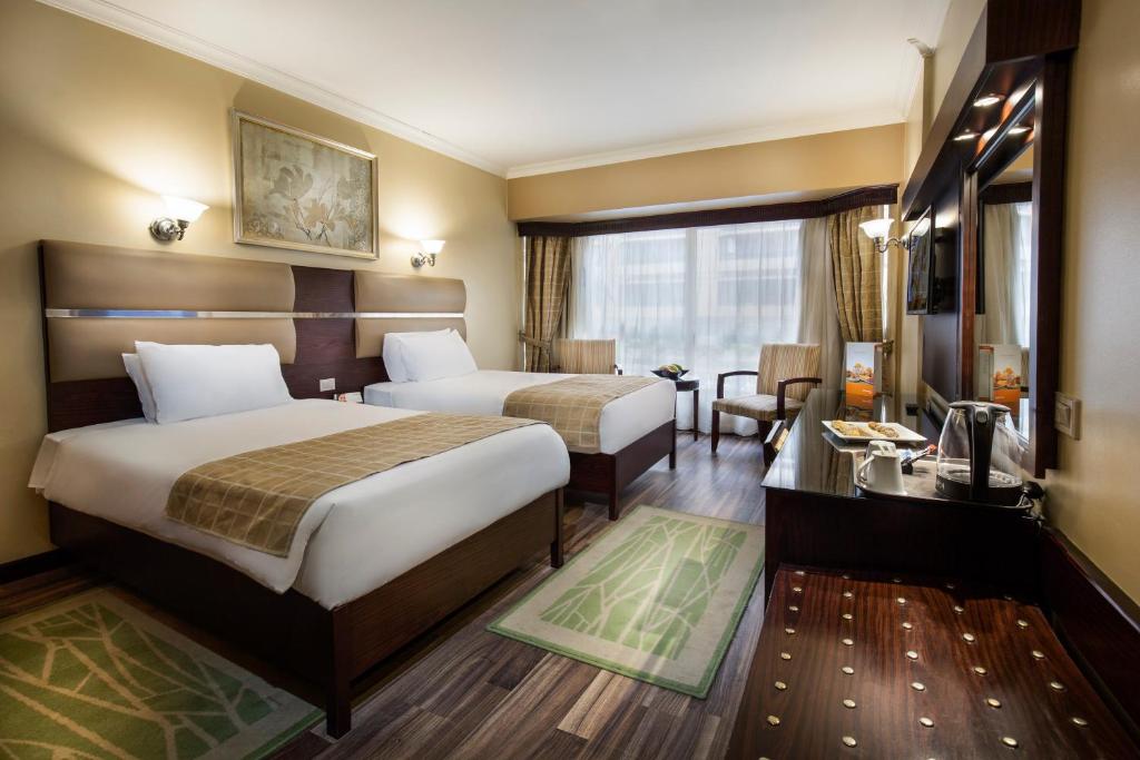 غرف فندق بيراميزا سويتس القاهرة